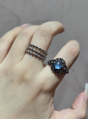 2025新品小众扭结款天然魔鬼海蓝宝钛钢托指环开口可调节戒指饰品