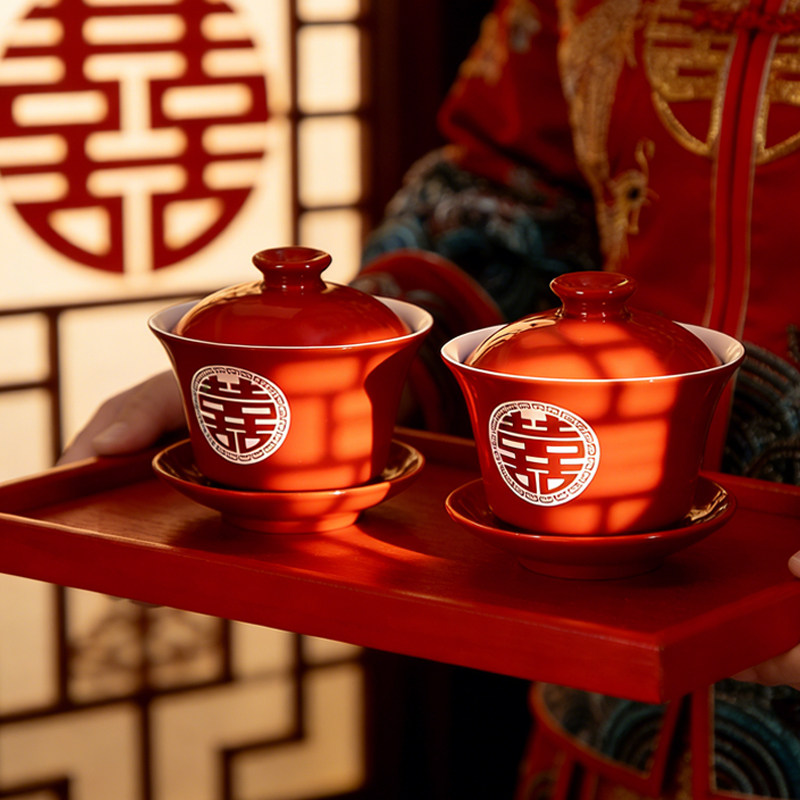 A pair of wedding cups and wedding bowls and chopsticks sets