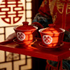 A pair of wedding cups and wedding bowls and chopsticks sets