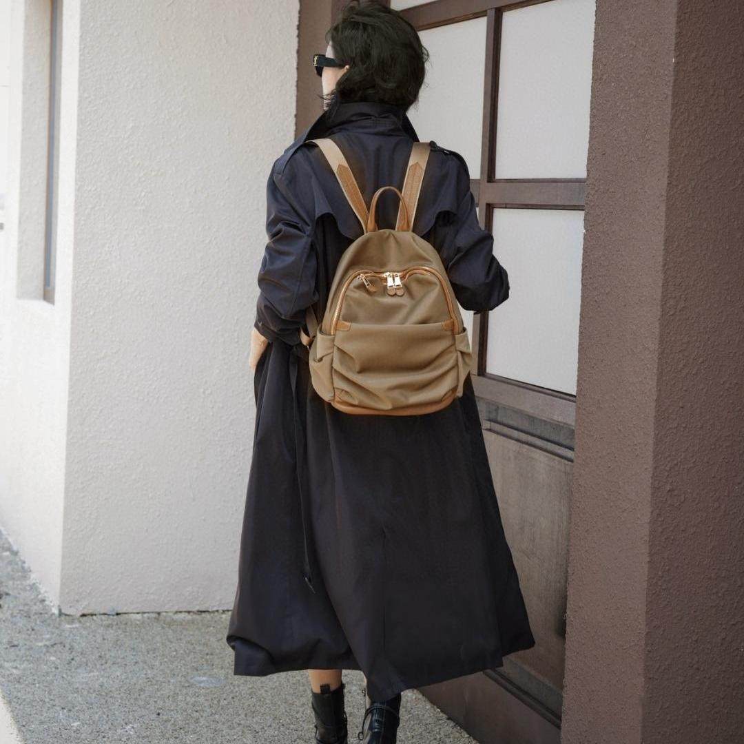 欧美休闲旅游大容量背包2026新款牛皮配防水布时尚百搭女双肩包潮,淘宝优惠券,粉丝福利购,淘宝优惠卷