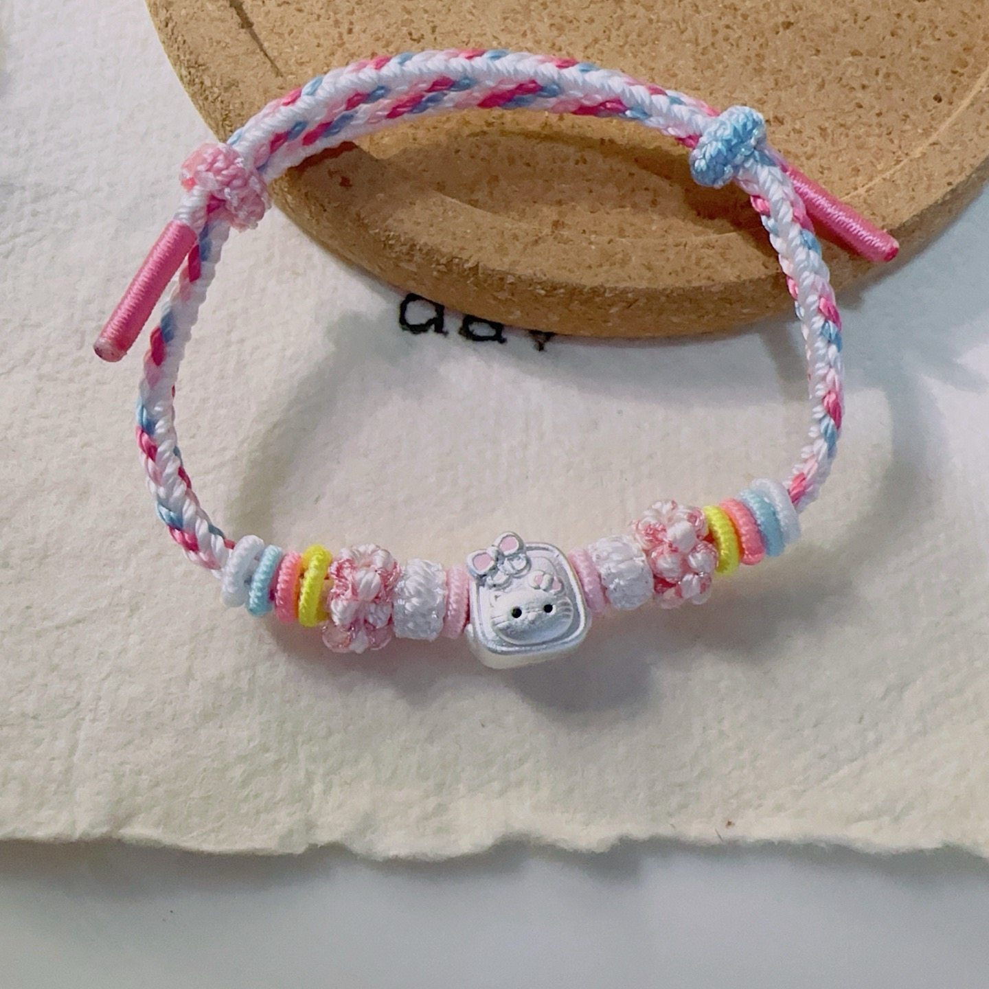 足银999 精工猫背书包转运珠配件纯银手工编织桃花手绳送女友礼物,淘宝优惠券,粉丝福利购,淘宝优惠卷