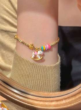 Paula  古法鎏金多巴胺粉珐琅彩蹦迪珠点钻摇摇小木马手链