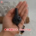 Ocarina 6 lỗ mới bắt đầu treble C gốm đen sắc nét SC vòng cổ nhỏ đồ trang trí nhỏ miễn phí chữ nhạc cụ - Nhạc cụ dân tộc