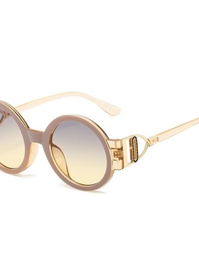 三角镜腿椭圆形女绿色太阳镜风