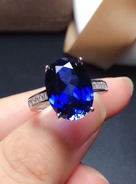 纯银镶嵌简单大方四爪托帕石戒指