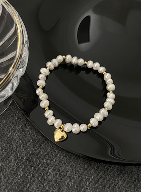 STINA高级感不规则珍珠爱心手链