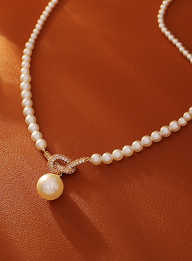 STINA高级感微镶打结珍珠吊坠项