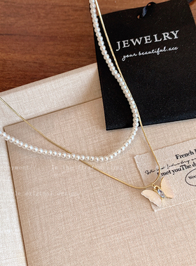 施家小米珍珠项链女款2026新款爆款双层叠戴蝴蝶锁骨链气质颈链夏