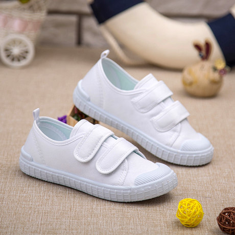 white canvas velcro shoes