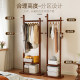 Solid wood clothes hanger at the end of the bed for storing clothes at night