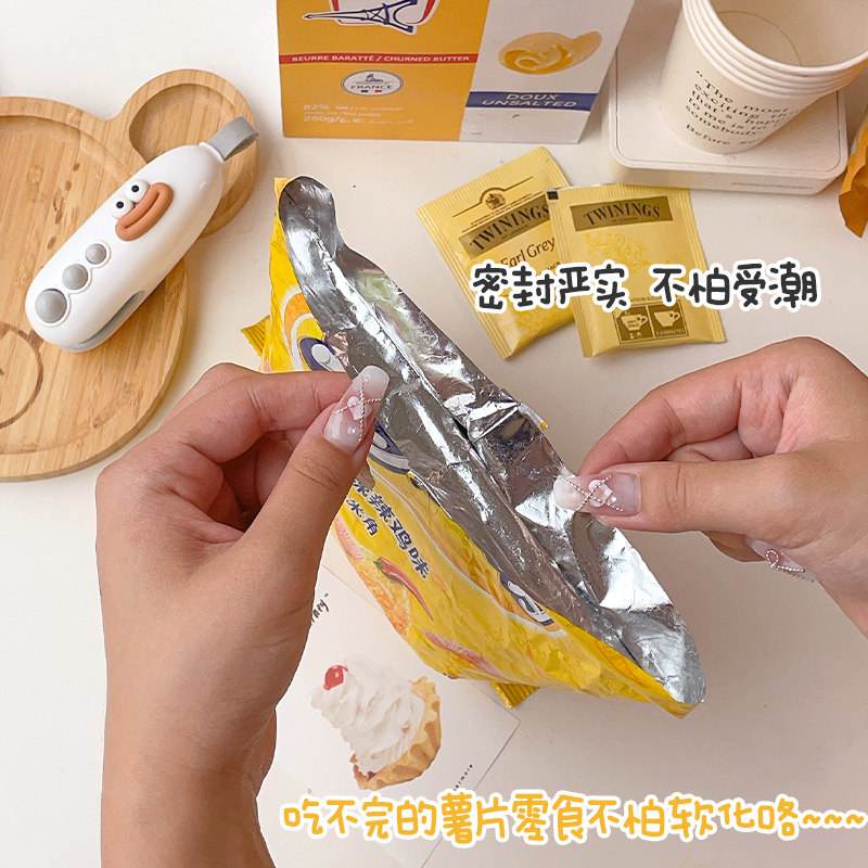 便携封口机家用手压式密封迷你小型食品袋封口神器裁切零食包装袋 - 图0