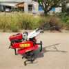 Hand push micro tiller, four-wheel drive multifunctional orchard tiller, small agricultural soil loosening tiller