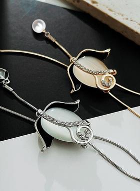 厂家直销韩版秋冬长款项链配饰郁金香猫眼石花朵毛衣链女气质项链