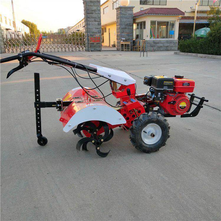 173 Diesel air-cooled four-wheel drive micro tillage machine, mountain small agricultural hand-held rotary tiller, ditching and ridging machine price