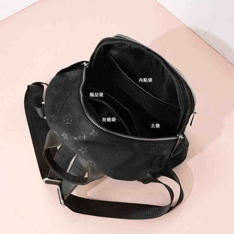 高级感牛津布双肩背包女2025新款时尚书包轻便印花防水旅行包包潮,淘宝优惠券,粉丝福利购,淘宝优惠卷