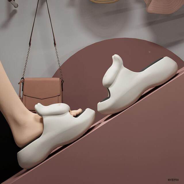 New 7.0cm heightening EVA rabbit thick-soled slippers for women's summer home indoor and outdoor wear on the beach with a shit-stepping feeling.