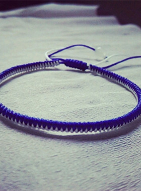 蓝白手工红绳情侣款转运金刚结