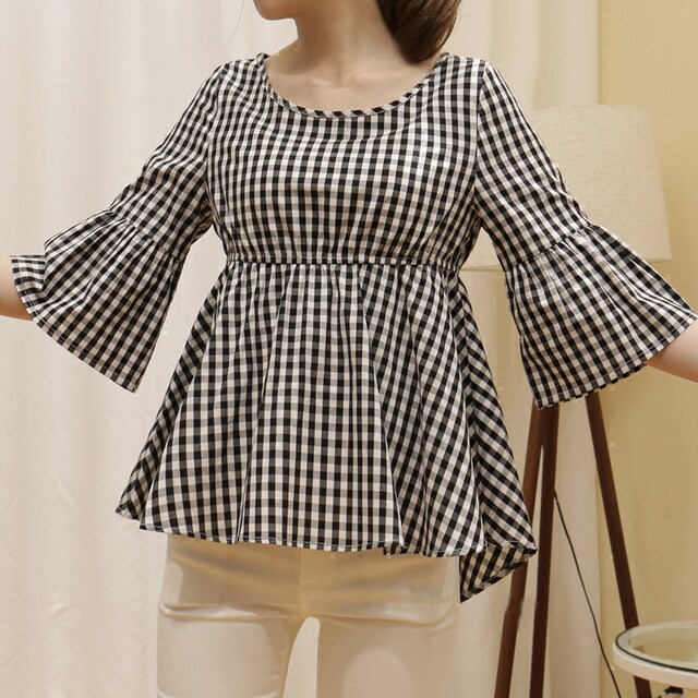 Black and white cropped plaid shirt with short front and long back