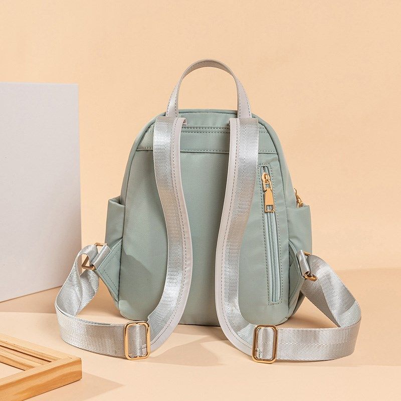 2024新款牛津布双肩包女韩版简约时尚休闲小背包轻便防水迷你布包,淘宝优惠券,粉丝福利购,淘宝优惠卷