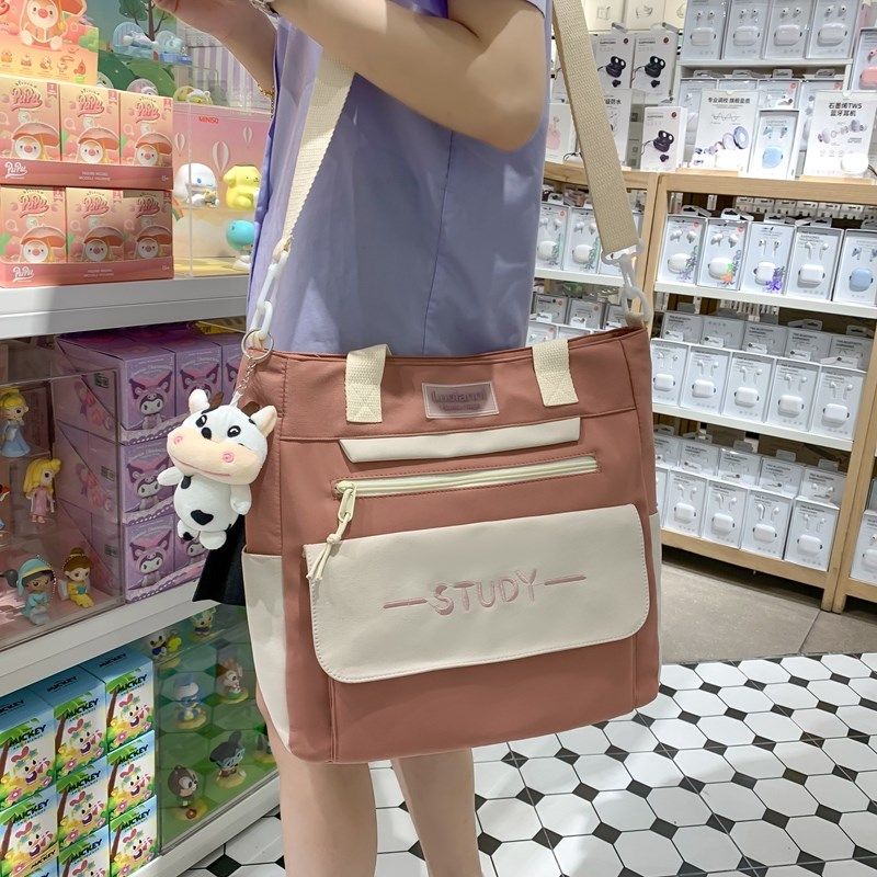 斜挎包可爱少女中学生小学生补课包手提袋补习大学生单肩包帆布包,淘宝优惠券,粉丝福利购,淘宝优惠卷
