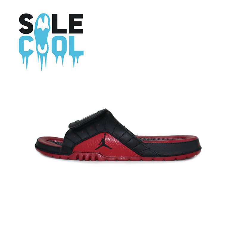 red and gold nike slippers