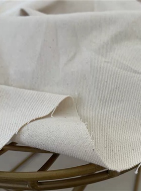 工厂剩余原色未染色斜纹纯棉布料有棉籽夹克服装白色面料清仓处理
