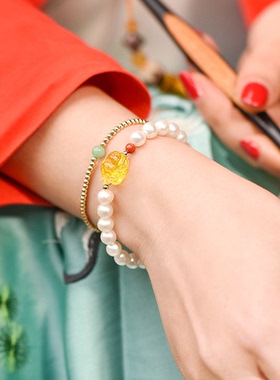 觉人强光近圆琥珀蜜蜡生肖手链