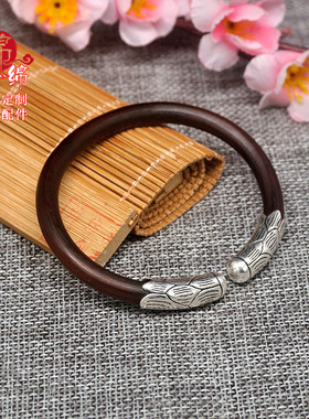 西藏野生无节羽毛配饰鸡血藤手镯
