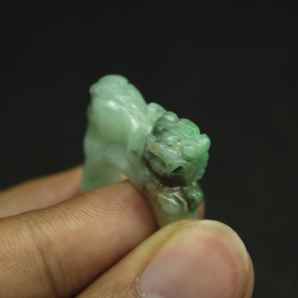 Burmese natural waxy green Pixiu ring and jade