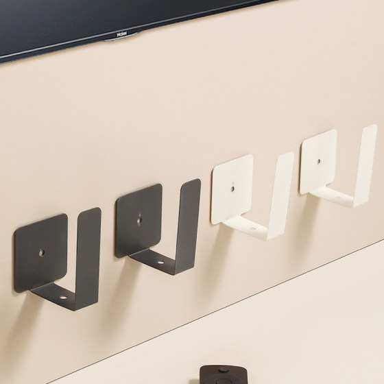 Router placement rack without punching holes for wall hanging