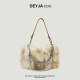 The same furry shoulder handbag in the mall