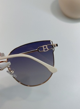 金属新款猫眼太阳镜女时尚出游防晒墨镜防紫外线感偏光太阳镜