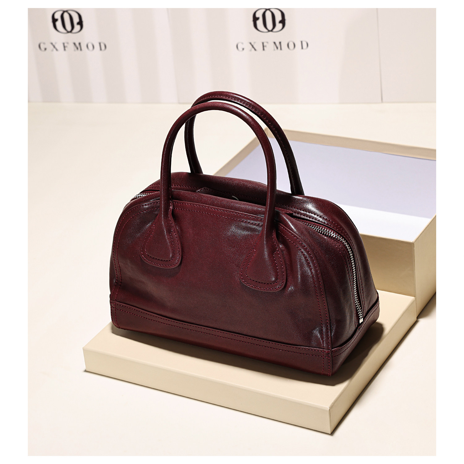 GXFMOD原创设计真皮波士顿枕头包女2025秋冬轻奢复古手提斜挎包包,淘宝优惠券,粉丝福利购,淘宝优惠卷