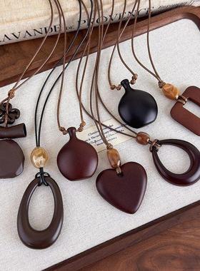 新中式复古长款不规则镂空木质吊坠项链时尚小众设计高级感毛衣链