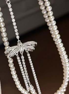 深圳旭佳旭家满钻蝴蝶结流苏正圆施家珍珠长款毛衣链女高级感气质