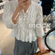 Luoluo Gongjie ເສື້ອຢືດ lace ບາງໆ summer cardigan ສີຂາວ