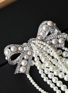 僵硬猫玻璃珍珠串珠女蝴蝶结流苏