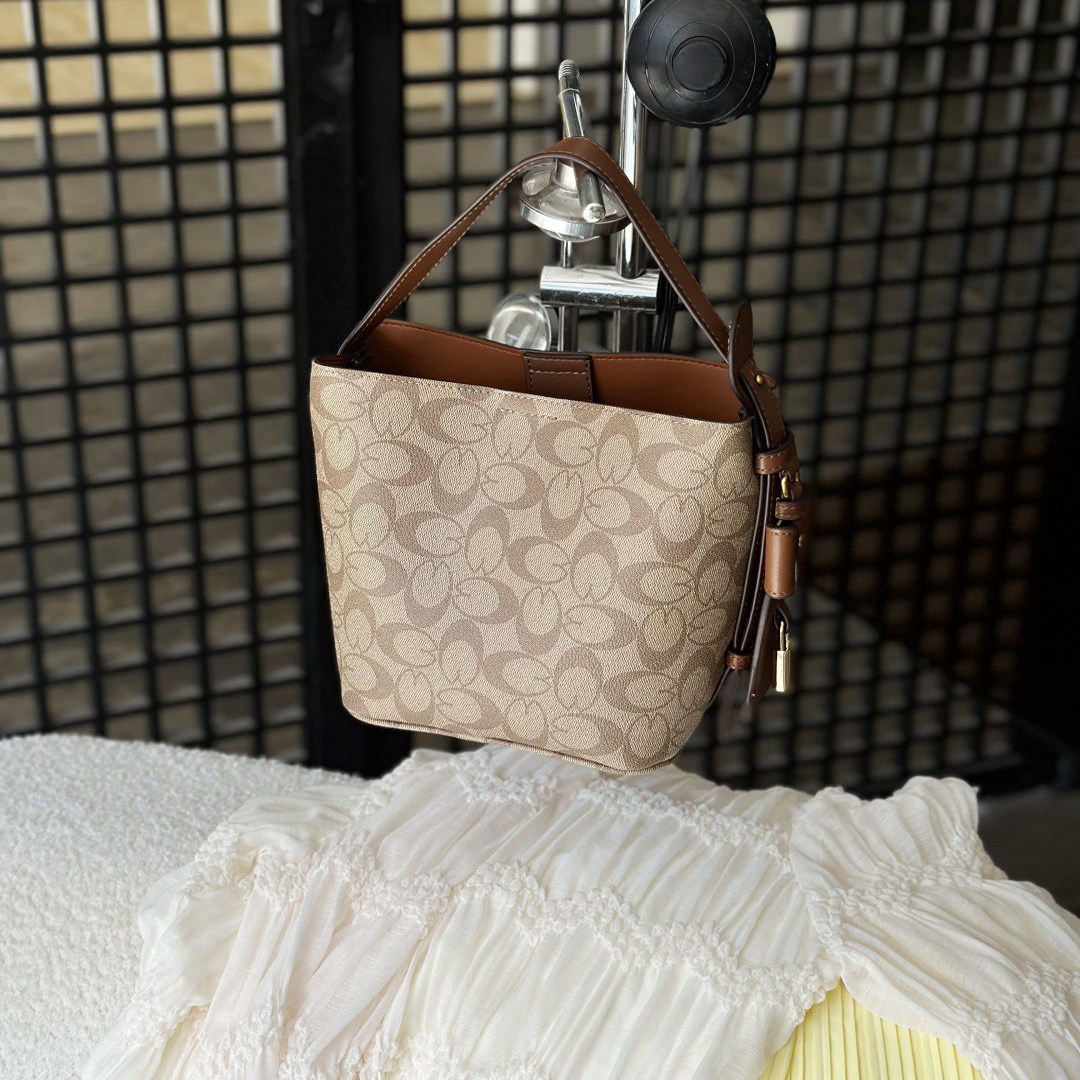 优草坊2025新款高级感水桶包休闲百搭单肩斜挎包简约时尚款老花包,淘宝优惠券,粉丝福利购,淘宝优惠卷