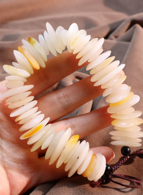 新疆金皮隔片珠白玉籽料原石手串