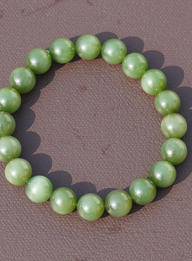 俄罗斯油润细腻阳绿碧玉猫眼手串