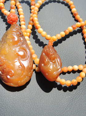 红皮独颗黄玉籽料牌子型财神吊坠