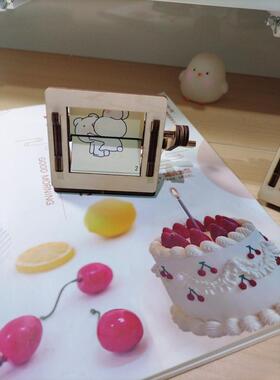 线条小狗摇摇乐解压玩具手摇打屁屁动画机发泄搞笑转动创意小摆件