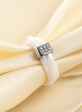 时尚钛钢戒指黑白陶瓷光圈交叉相套钛钢镶钻戒指情侣戒指戒指指环