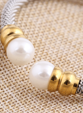 时尚风镶珍珠钛钢手环