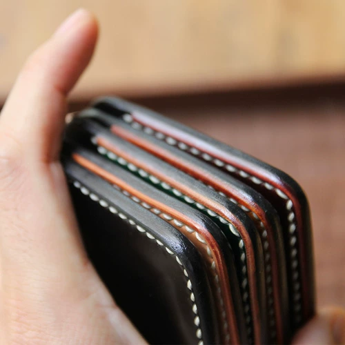 Медленная работа ручной работы сумки для карт