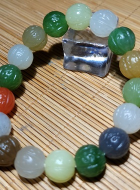 新疆的猫zg121509 39.0克搭配艳丽多彩的和田玉仿古纹南瓜珠手链