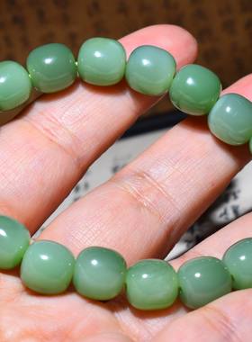 新疆的猫JJ122510  31.3克，油亮粉绿色老料碧玉老型珠手链