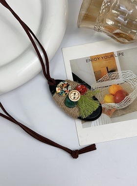 异域风纽扣皮叶子吊坠女款项链