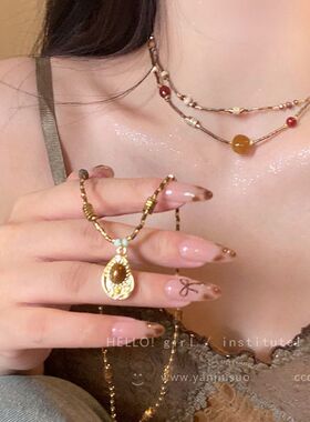 复古美式虎眼石项链女2025新款高级感毛衣链配饰轻奢小众颈链吊坠