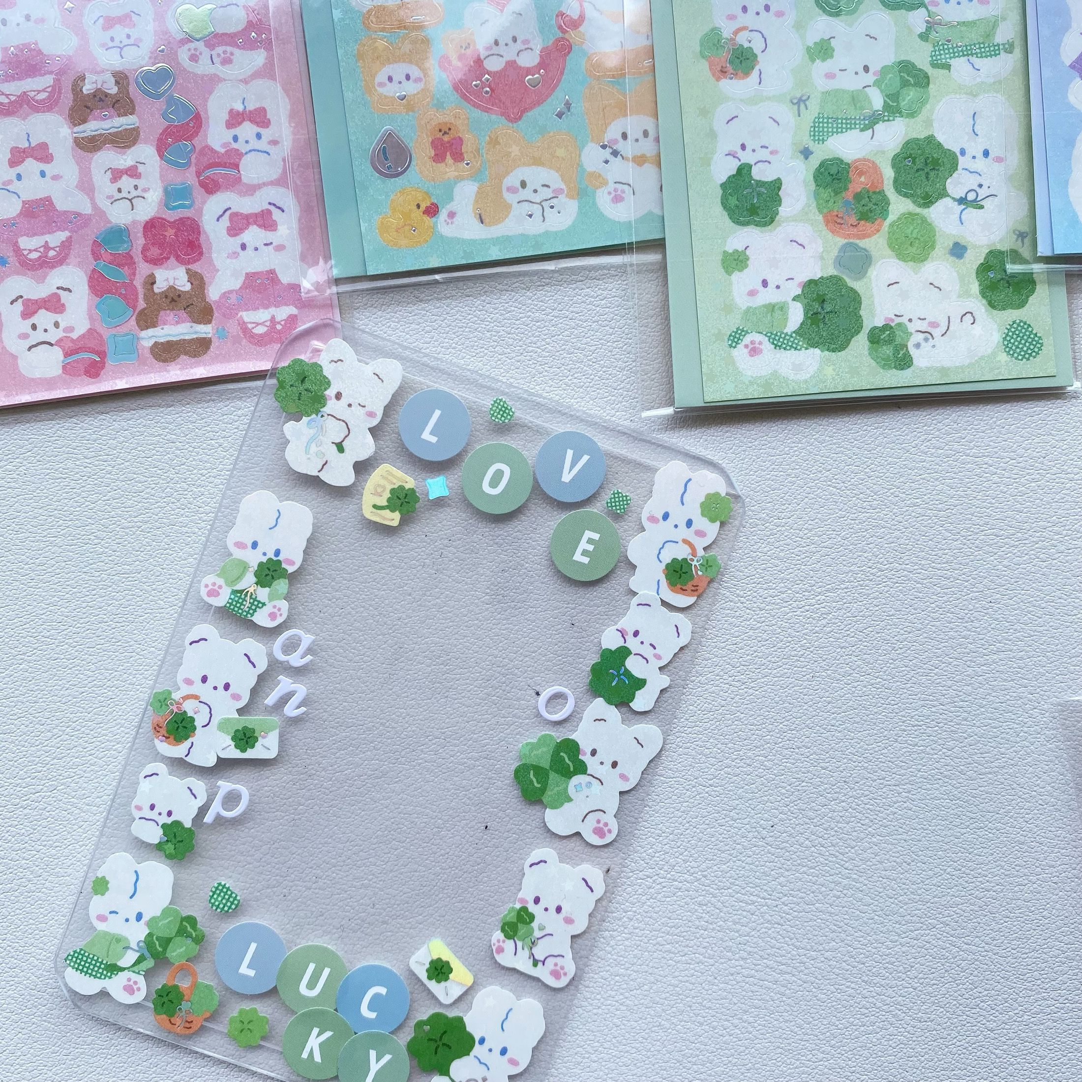韩国ins可爱小熊布丁兔咕卡贴纸镭射卡通四叶草diy手帐素材贴画 - 图0